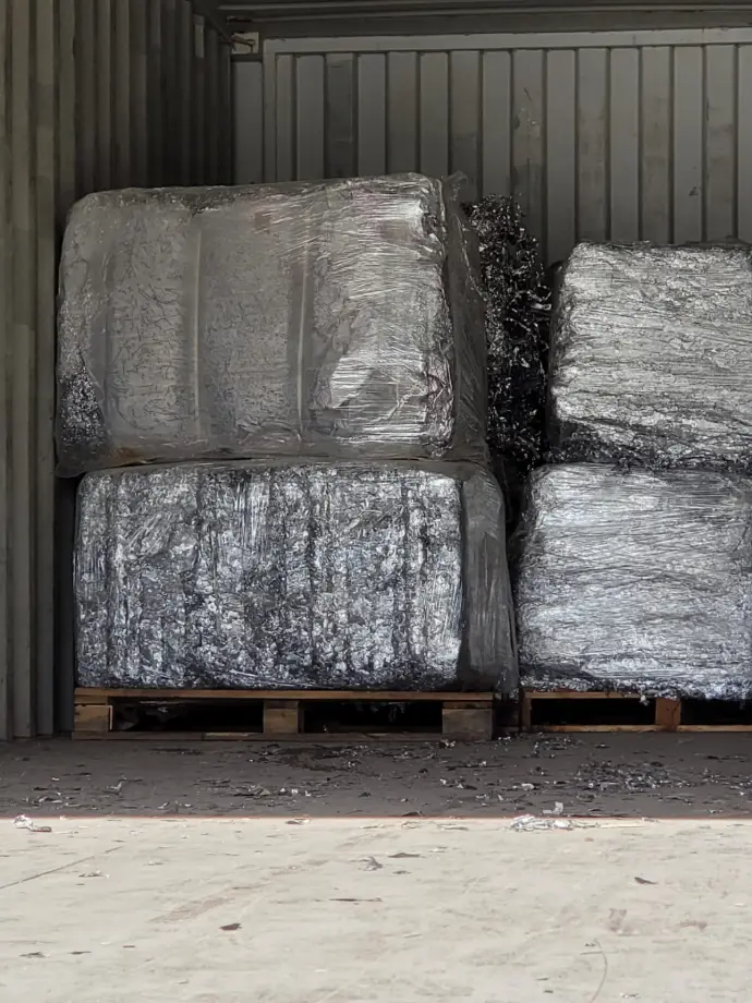 Stacked aluminum bales ready for export at Continental Exports